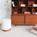 Boucle Velvet poefje Piano gebroken wit Teak